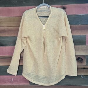 Soft Surroundings Valentina Zip Sweater with a gold zipper.